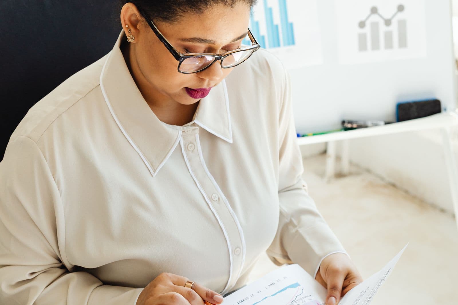 Business owner reviewing a finance chart